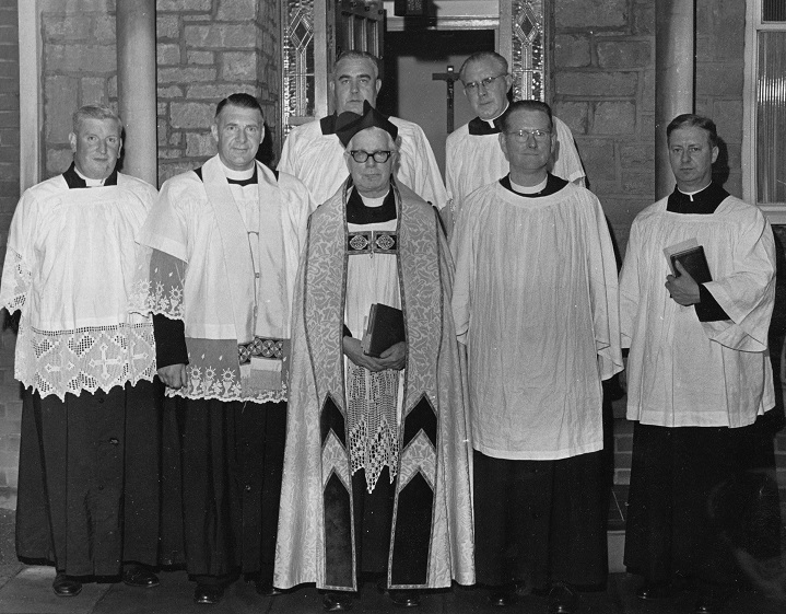 Fr Tom Wilson with other clergy